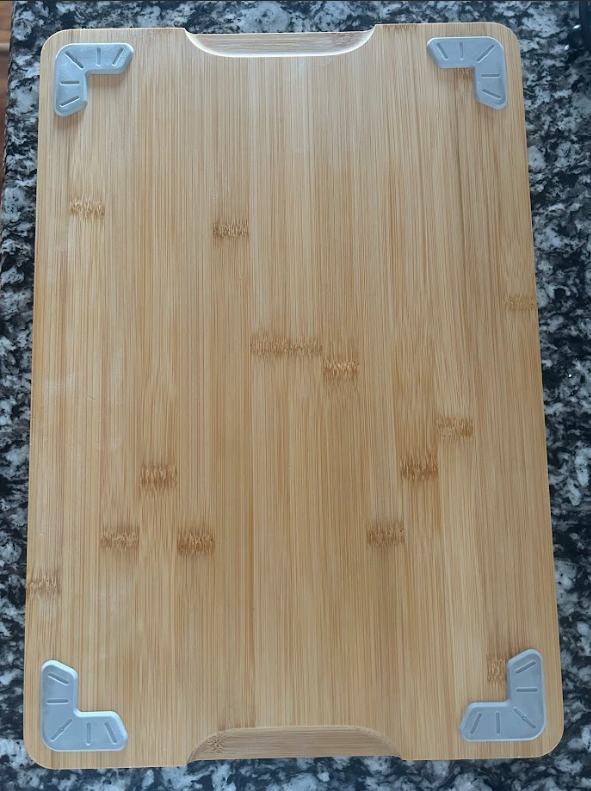Bottom of handmade charcuterie board with rubber feet